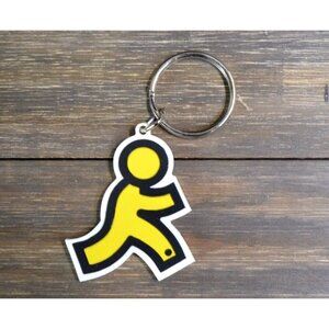 America Online Keychain AOL Logo Instant Messenger Running Man Rubber